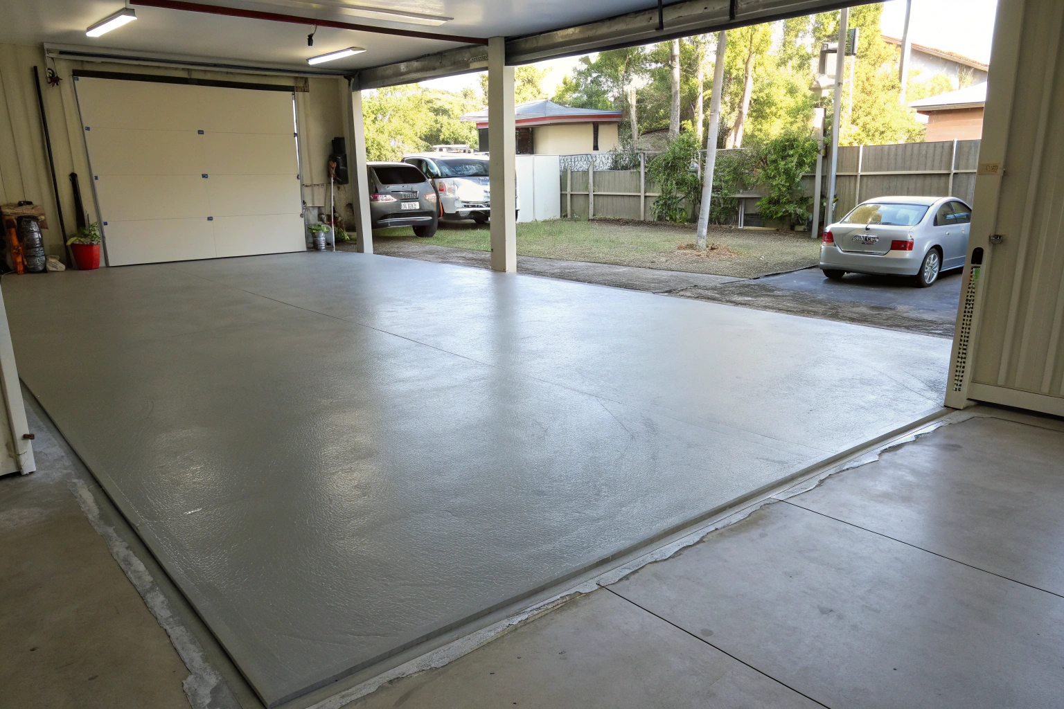 finished attached double garage slab Hervey Bay steel trowel concrete floor